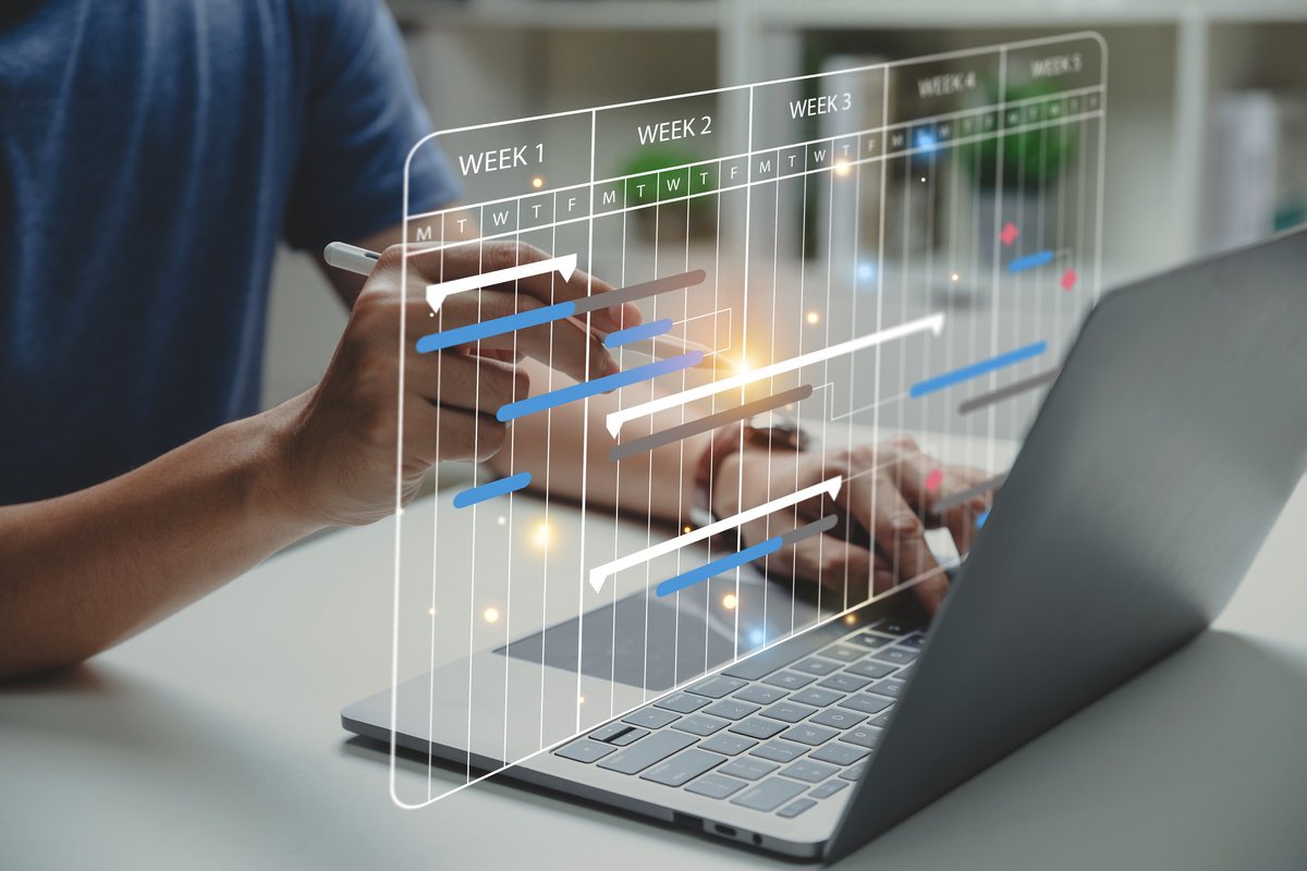 auto body shop owner using scheduling software