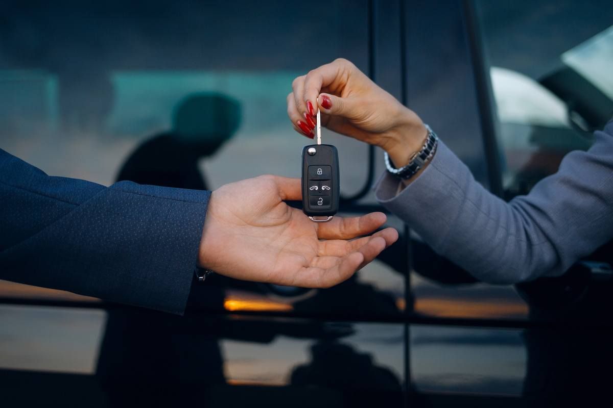 customer returning rental car to collision repair center