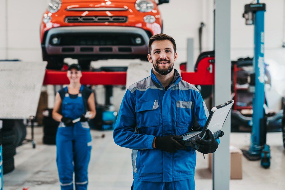 collision repair employees with good morale