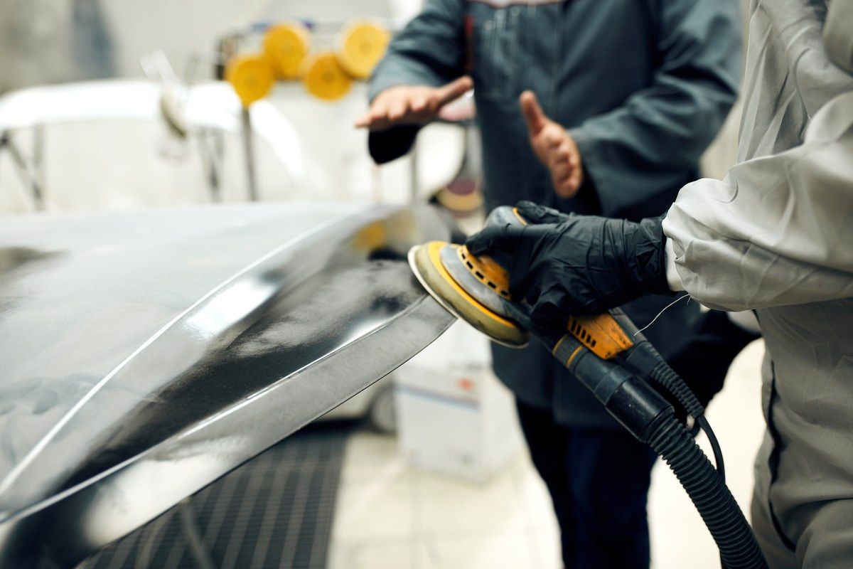 collision repair employee in training